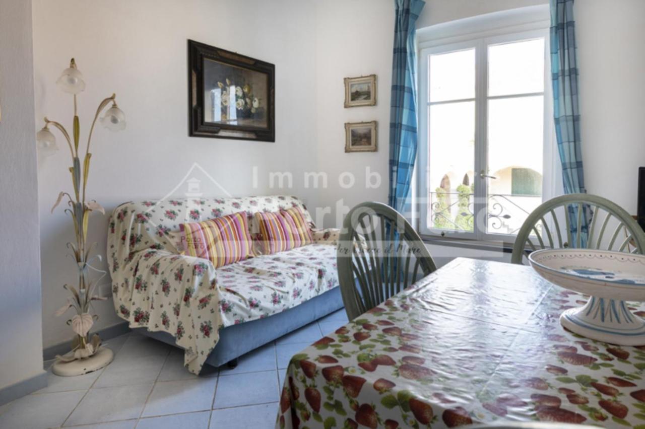 Villa 12 CENTRO - Trilocale vista mare sul Faro di Porto Faro Palau Esterno foto