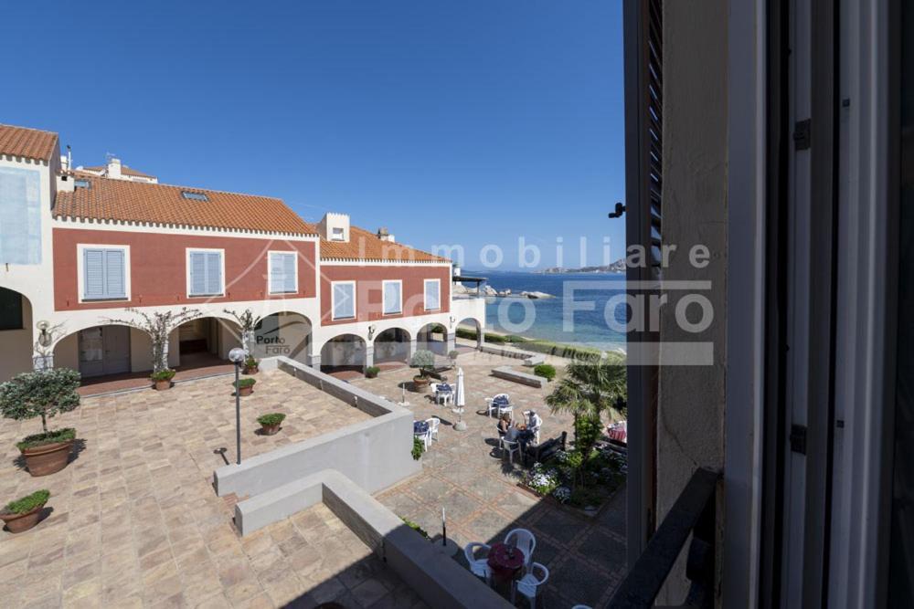 Villa 12 CENTRO - Trilocale vista mare sul Faro di Porto Faro Palau Esterno foto