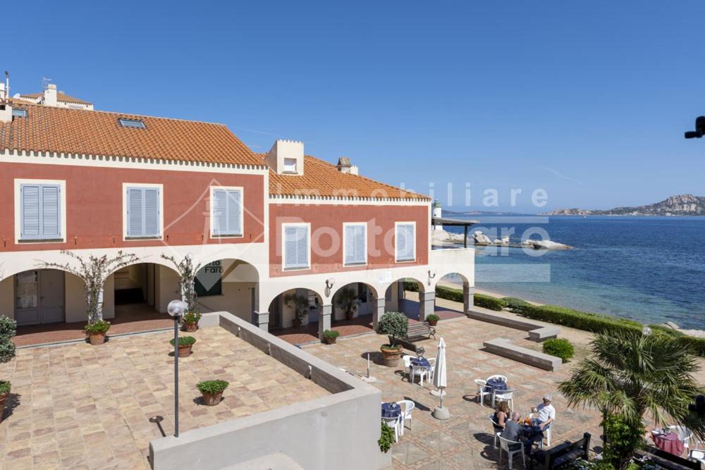 Villa 12 CENTRO - Trilocale vista mare sul Faro di Porto Faro Palau Esterno foto
